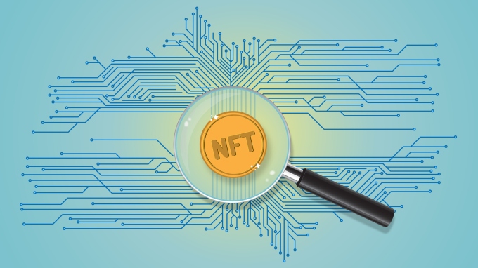 Golden Non Fungible Token under a magnifying lens with computer network circuit.