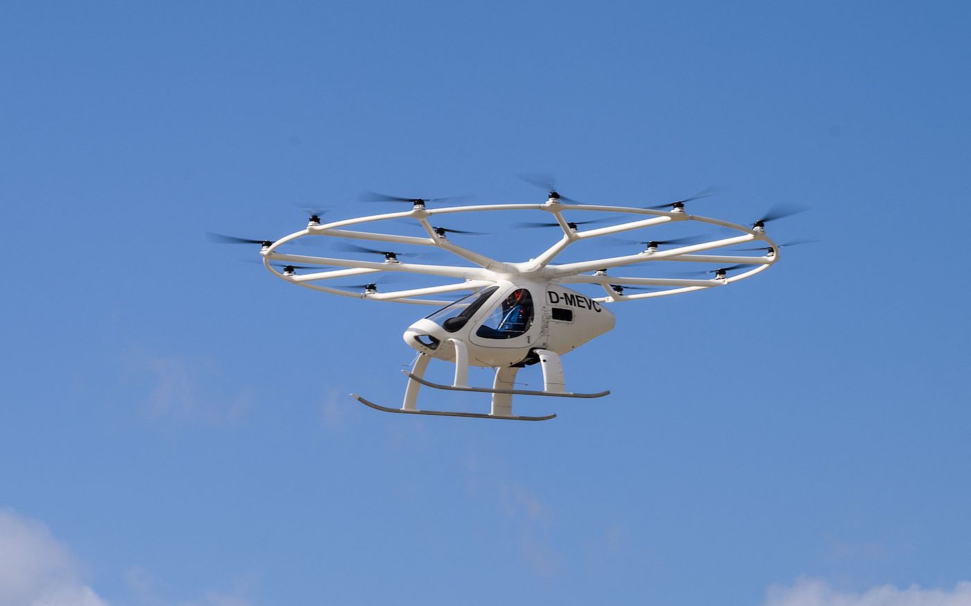 Germany-based company Volocopter 2X's air taxi is flown by test pilot Damian Hischier during a demonstration of South Korea's Urban Air Mobility services at Gimpo International Airport in Seoul in November 11, 2021, in the first ever crewed public test flight of a fully electric vertical take-off and landing (eVTOL) air taxi in South Korea. (Photo by Anthony WALLACE / AFP) (Photo by ANTHONY WALLACE/AFP via Getty Images)