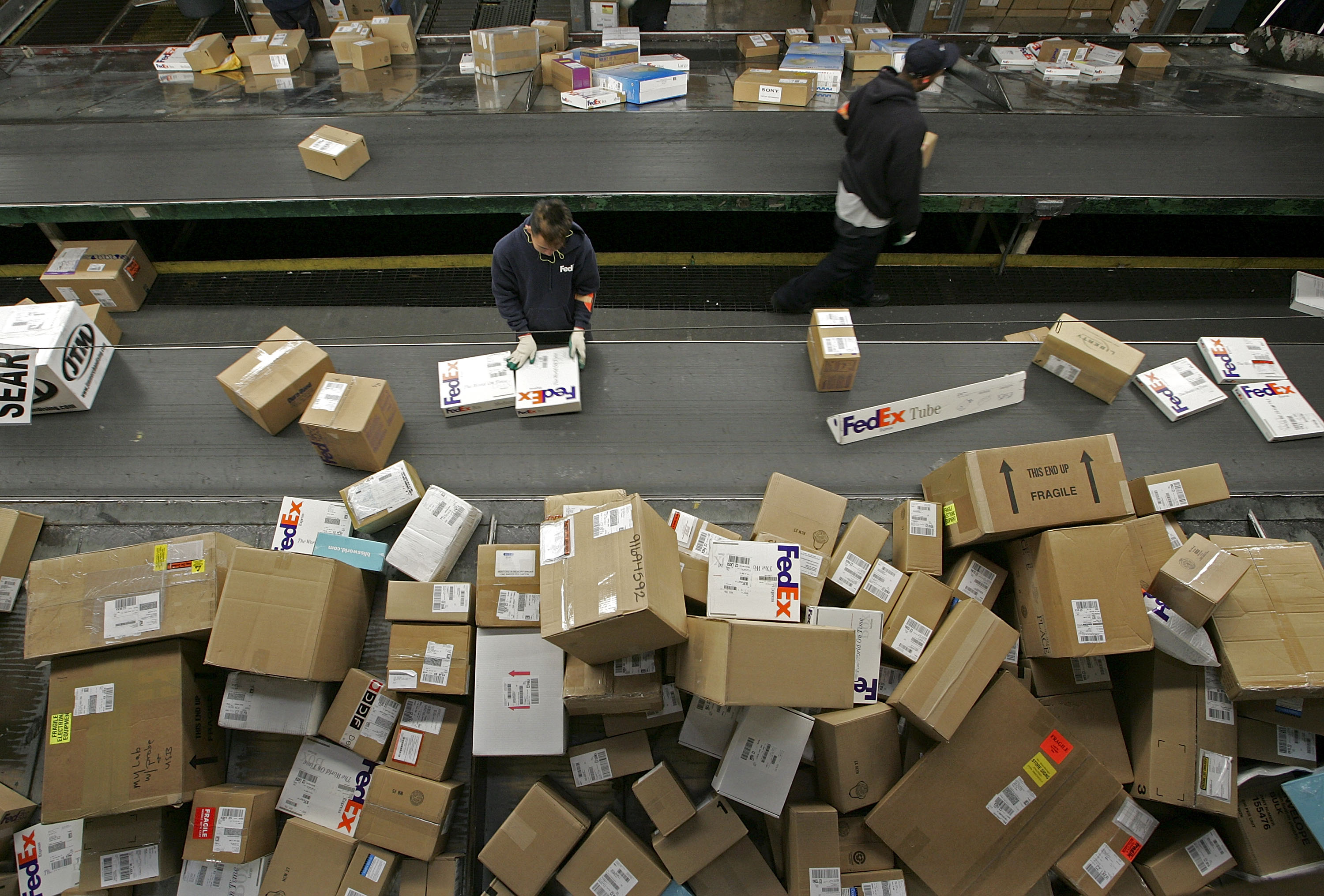 UPS And FedEx Deliver Packages As Holiday Shopping Season Begins